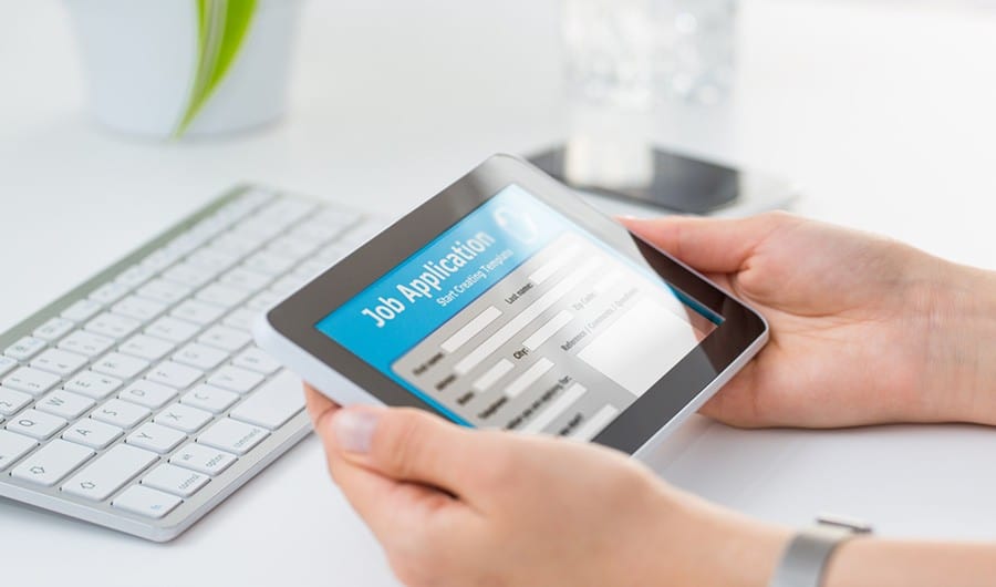 Fotolia_88802682_BlogW applicant screening on tablet