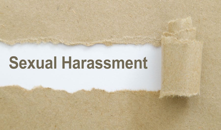 Blog-11-21-18_159230307 torn paper with words sexual harassment