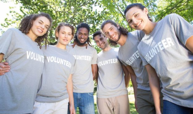volunteers in huddle